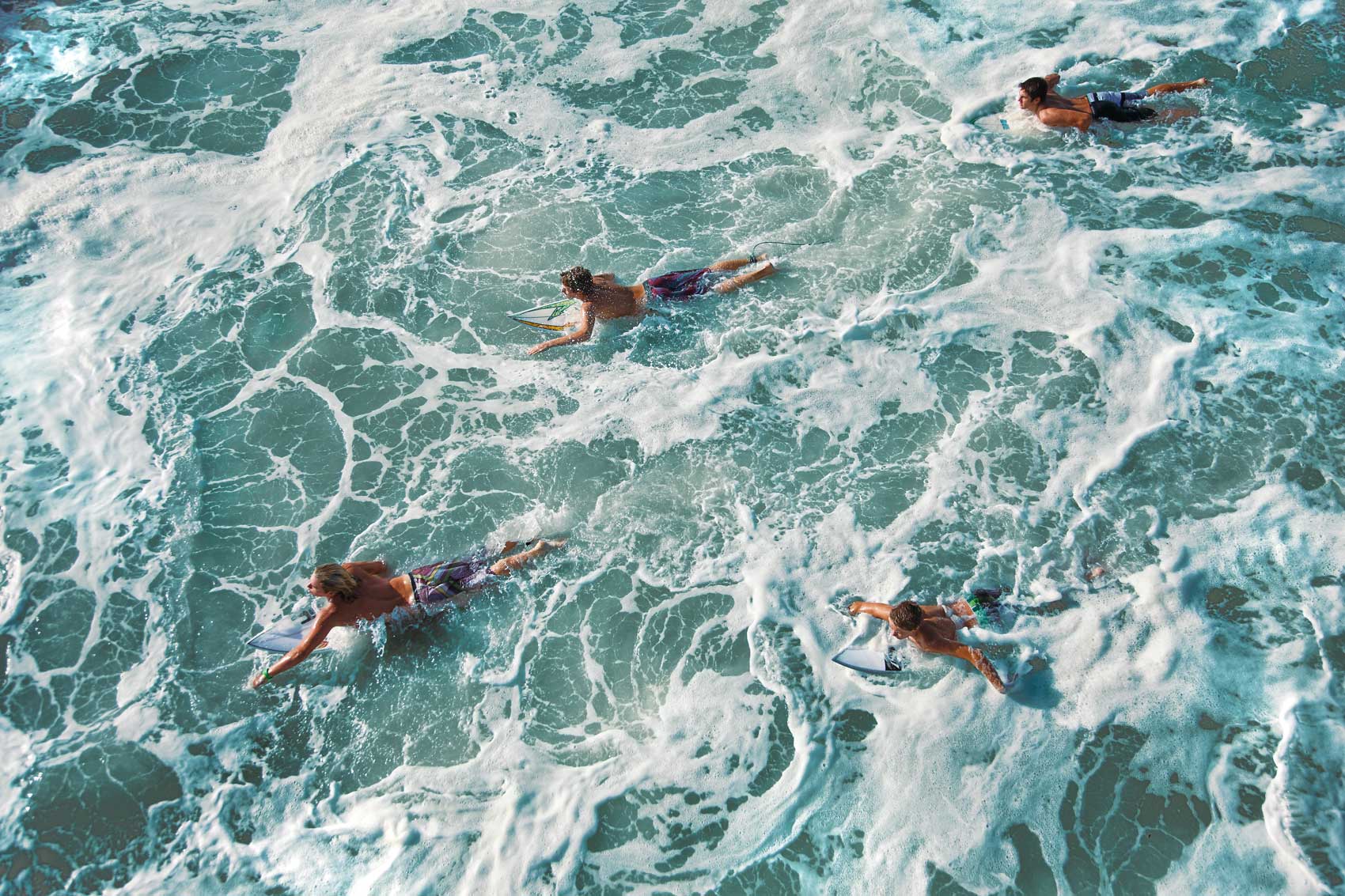 012-surfers-swimming-out-foam-from-above-Worked-more